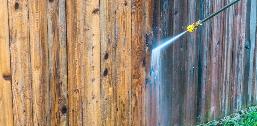 Pressure washing a fence